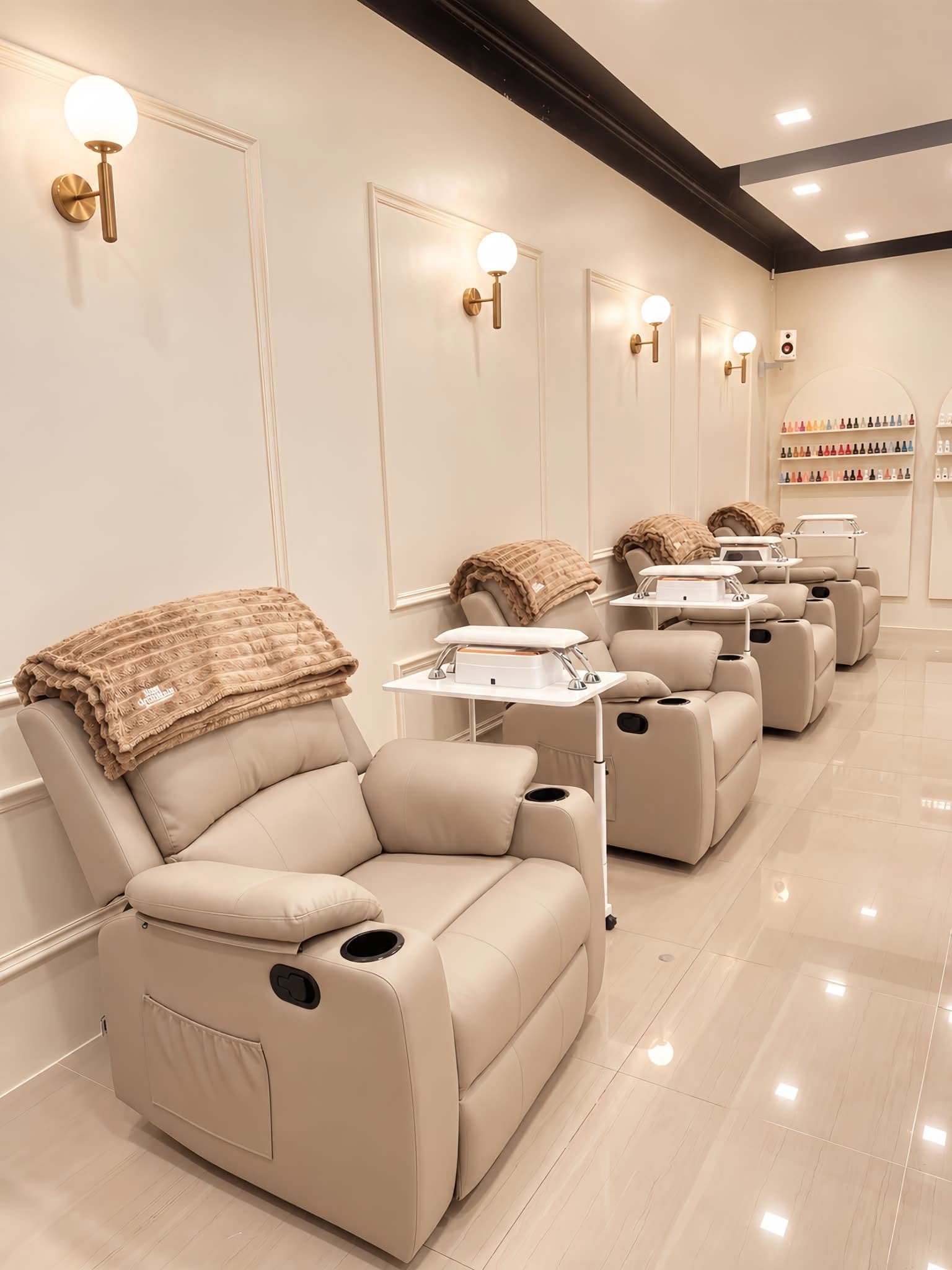 Hey Dreamy Banawa, Cebu City: cream pedicure chairs, warm globe lights and shelves of nail colours